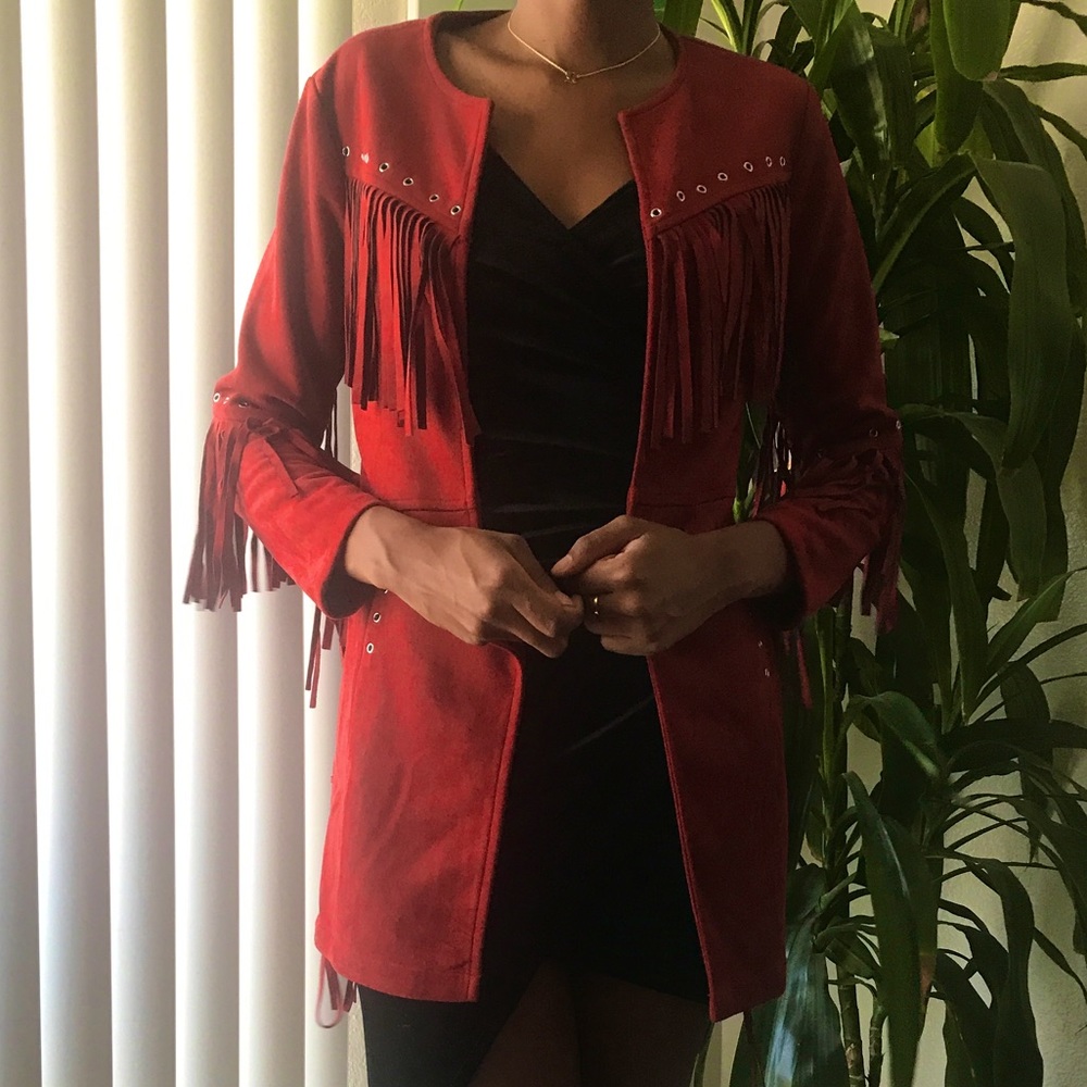 Vintage red leather fringe jacket.